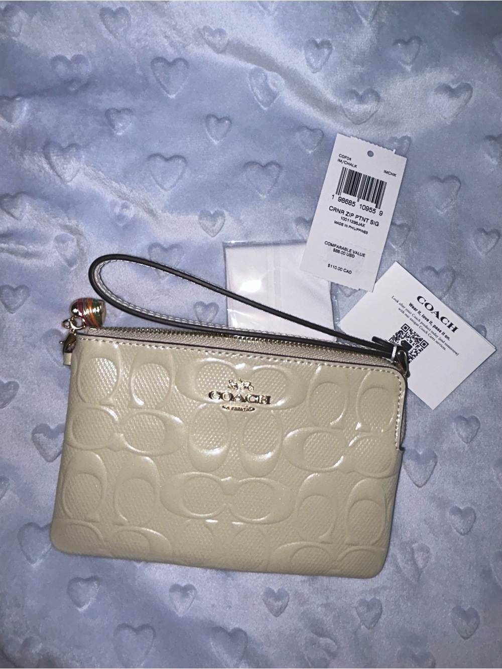 Coach Cream Embossed Signature Wristlet Clutch with Charm